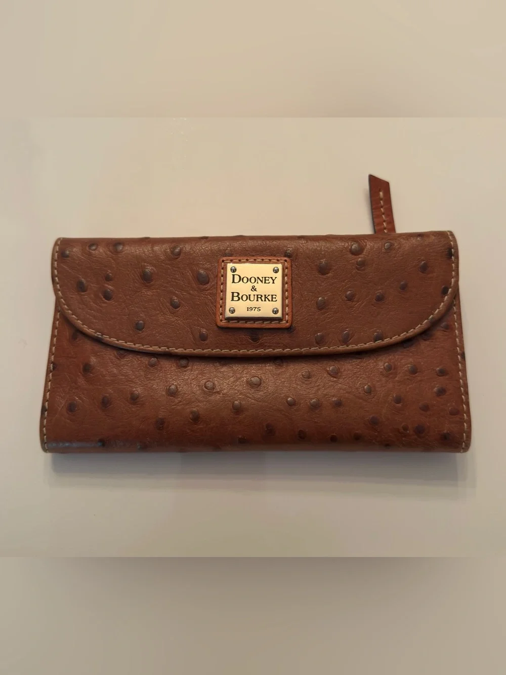 DOONEY & BOURKE CARAMEL/TAN OSTRICH-EMBOSSED CONTINENTAL CLUTCH